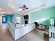 Spacious living room with fireplace and access to backyard patio at 13653 Heritage Way, Sarasota, FL 34240