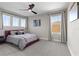 Spacious bedroom with plush carpet and large windows at 14215 Swiss Bridge Dr, Riverview, FL 33579