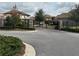 Gated community entrance with stone pillars at 14215 Swiss Bridge Dr, Riverview, FL 33579