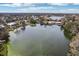 Aerial view showcasing waterfront homes and a tranquil lake at 1960 Union St # 42, Clearwater, FL 33763