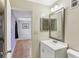 Bathroom with vanity and mirror, near bedroom at 1960 Union St # 42, Clearwater, FL 33763