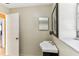 Small bathroom with white sink and dark vanity at 1960 Union St # 42, Clearwater, FL 33763