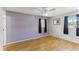 Bedroom with hardwood floors and purple accent wall at 1960 Union St # 42, Clearwater, FL 33763