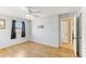 Hardwood floor bedroom with ceiling fan and closet at 1960 Union St # 42, Clearwater, FL 33763