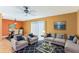 Bright living room with dining area, featuring comfortable seating and tile floors at 1960 Union St # 42, Clearwater, FL 33763