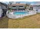 Inviting community pool with surrounding lawn at 1960 Union St # 42, Clearwater, FL 33763
