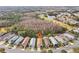 Aerial view of home and community, showcasing surrounding landscape and golf course at 21042 Diamonte Dr, Land O Lakes, FL 34637