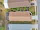 House and backyard aerial view, showing a well-maintained landscape and screened patio at 21042 Diamonte Dr, Land O Lakes, FL 34637