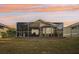 Screened patio and backyard with lush grass, offering relaxing outdoor space at 21042 Diamonte Dr, Land O Lakes, FL 34637