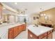 Modern kitchen with island and stylish light fixtures at 21042 Diamonte Dr, Land O Lakes, FL 34637