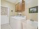 Laundry room with washer, dryer, and utility sink at 21042 Diamonte Dr, Land O Lakes, FL 34637