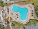 Resort-style pool with surrounding lounge chairs at 21042 Diamonte Dr, Land O Lakes, FL 34637
