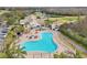Community pool with lounge chairs and spa at 21042 Diamonte Dr, Land O Lakes, FL 34637