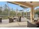 Relaxing screened porch with seating area at 21042 Diamonte Dr, Land O Lakes, FL 34637