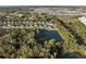 Aerial view of homes near a lake at 2307 Dakota Rock Dr, Ruskin, FL 33570