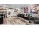 Finished basement bar with seating area, wine cooler and shelving at 2307 Dakota Rock Dr, Ruskin, FL 33570