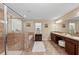 Spa-like bathroom with soaking tub and walk-in shower at 2307 Dakota Rock Dr, Ruskin, FL 33570