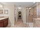Large bathroom with double vanity and walk in shower at 2307 Dakota Rock Dr, Ruskin, FL 33570