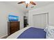 Bright bedroom with a dresser, TV and spacious closet at 2307 Dakota Rock Dr, Ruskin, FL 33570