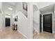 Bright entryway with tile flooring and staircase at 2307 Dakota Rock Dr, Ruskin, FL 33570