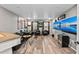 Game room with large screen TVs and seating at 2307 Dakota Rock Dr, Ruskin, FL 33570