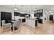 Modern kitchen with stainless steel appliances and an island at 2307 Dakota Rock Dr, Ruskin, FL 33570