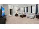 Spacious living room featuring a large sectional sofa at 2307 Dakota Rock Dr, Ruskin, FL 33570