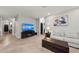 Living room features a large TV and comfortable seating at 2307 Dakota Rock Dr, Ruskin, FL 33570