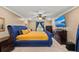 Luxurious main bedroom with a large bed and TV at 2307 Dakota Rock Dr, Ruskin, FL 33570