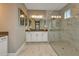 Spa-like bathroom with a large walk-in shower at 2471 Overfalls Pl, Wesley Chapel, FL 33543