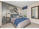 Stylish bedroom with a motocross-themed wall at 2471 Overfalls Pl, Wesley Chapel, FL 33543