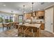 Modern kitchen with island, stainless steel appliances, and ample counter space at 2471 Overfalls Pl, Wesley Chapel, FL 33543