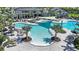 Relaxing resort-style pool with ample lounge chairs at 2471 Overfalls Pl, Wesley Chapel, FL 33543
