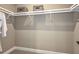 Spacious walk-in closet with shelving and hanging space at 2471 Overfalls Pl, Wesley Chapel, FL 33543
