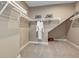 Large walk-in closet with ample shelving and hanging space at 2471 Overfalls Pl, Wesley Chapel, FL 33543