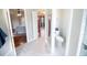 Clean bathroom with marble flooring and a toilet at 26932 Sea Breeze Way, Wesley Chapel, FL 33544