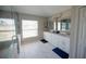 Spa-like bathroom featuring double vanity and marble floors at 26932 Sea Breeze Way, Wesley Chapel, FL 33544