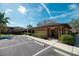 Community building with parking and landscaping at 26932 Sea Breeze Way, Wesley Chapel, FL 33544