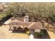 Aerial view of a playground with play structures, picnic tables, and a pavilion at 26932 Sea Breeze Way, Wesley Chapel, FL 33544