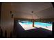 Community swimming pool with covered access at 26932 Sea Breeze Way, Wesley Chapel, FL 33544
