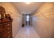 Large walk-in closet with ample shelving and a window at 26932 Sea Breeze Way, Wesley Chapel, FL 33544