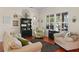 Cozy living room with neutral colors and a large window at 2902 Big Cypress Way, Wesley Chapel, FL 33544