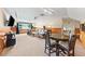 Spacious living room boasts comfortable seating, a dining table, and ample natural light at 2902 Big Cypress Way, Wesley Chapel, FL 33544