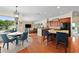 Open concept living space featuring a modern kitchen and comfortable living area at 2902 Big Cypress Way, Wesley Chapel, FL 33544