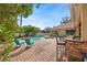 Enjoy this private backyard oasis with heated pool, spa, brick patio and outdoor kitchen at 2902 Big Cypress Way, Wesley Chapel, FL 33544