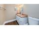 Clean bathroom with updated vanity and flooring at 308 E Ross Ave, Tampa, FL 33602