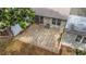 Private patio with geometric tile and screened-in porch at 356 Bay Pl, Safety Harbor, FL 34695