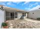 Spacious patio with AC unit and screened enclosure at 356 Bay Pl, Safety Harbor, FL 34695