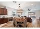 Bright dining area with chandelier and hardwood floors at 5125 Autumn Ridge Dr, Wesley Chapel, FL 33545