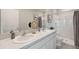 Double vanity bathroom with shower and plenty of counter space at 515 Mangrove Shade Cir, Apollo Beach, FL 33572
